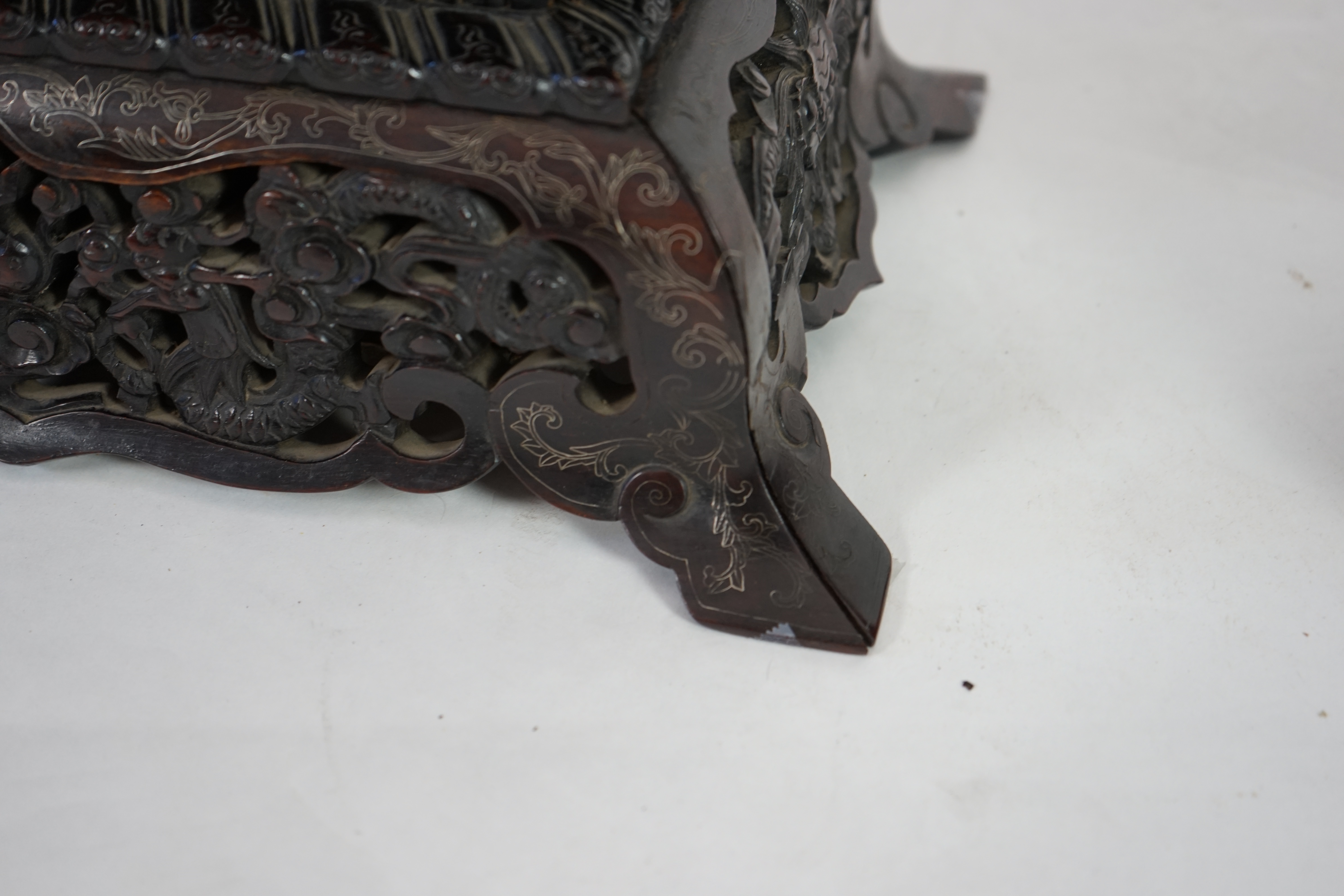An important pair of Chinese carved zitan and silver wire inlaid ‘cloud and dragon’ curio cabinets and stands, duobaoge, probably Imperial, late Qing dynasty